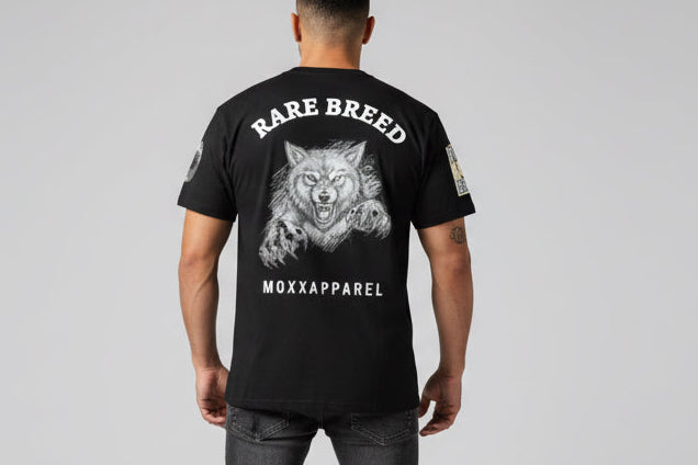 Black t-shirt with a wolf graphic and 'Rare Breed' text on a white background