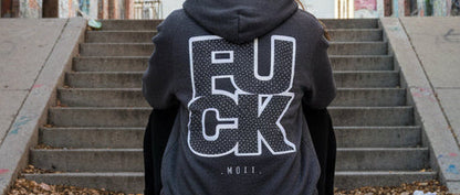 Dark gray hoodie with white text on the back against a white background