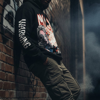 Black hoodie with graphic design on the back featuring a woman holding a gun and the word 'MOXX'.